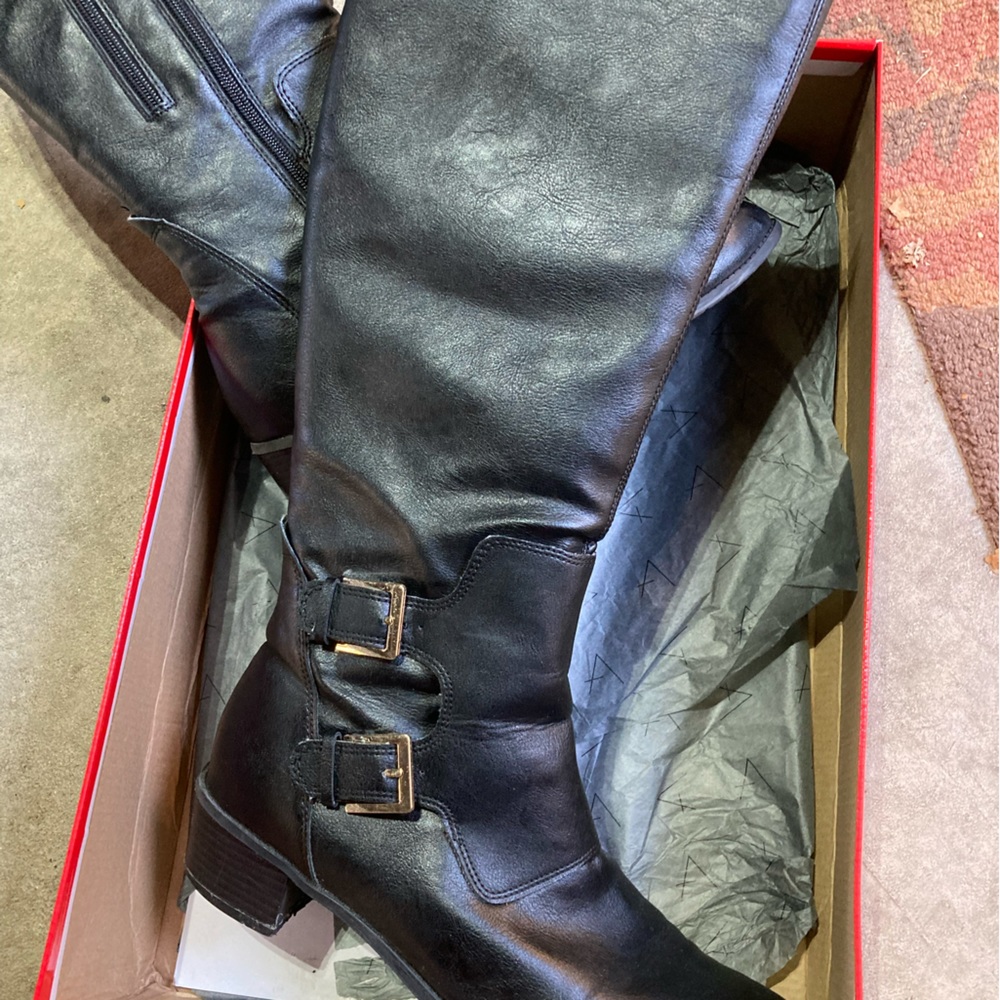 Tall black boots
